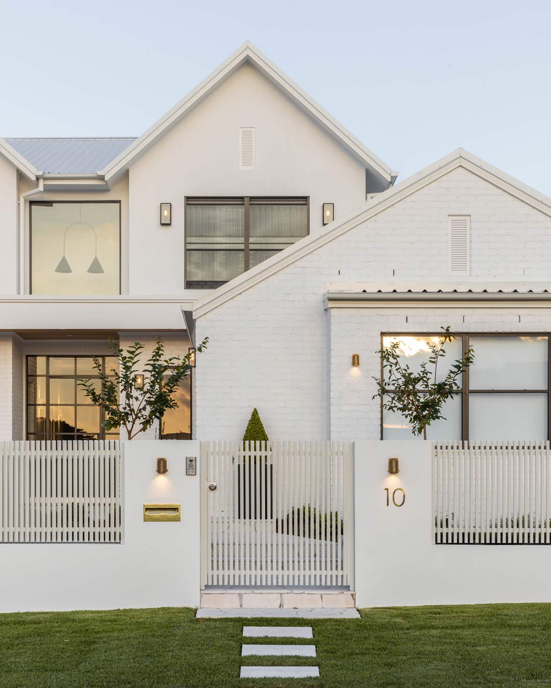 A-grand-elegant-front-entry-with-beautiful-lighting-and-curb-appeal