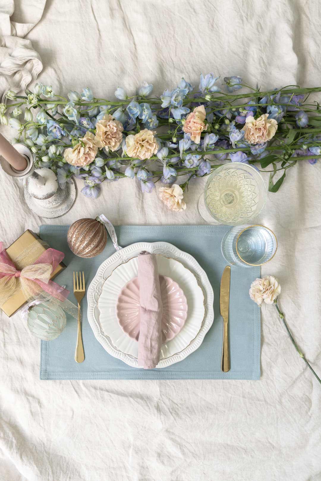 Christmas Table Decorations 4 Table Setting Ideas For 2022 ABI Interiors   An Elegant Provincial Style Christmas Table Setting With Pastel Colours Like Blue And Pink With Gold Or Brass Accents And Antique Vintage Charm 